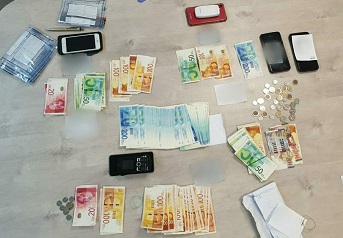 המשטרה עצרה 5 חשודים שעשו שימוש בשטרות מזויפים בבתי עסק בשפרעם